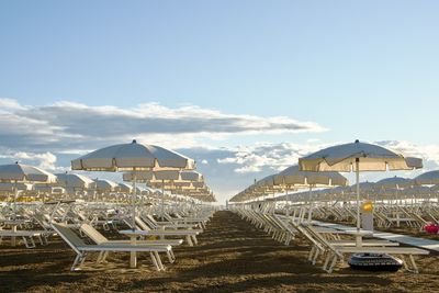 High angle view of beach umbrellas against sky