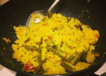 High angle view of yellow food in container