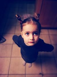 Portrait of cute baby at home