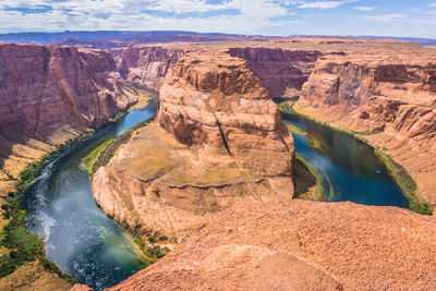 Scenic view of rock formations in river