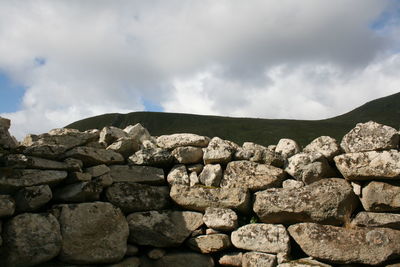 Stack of stones against sky