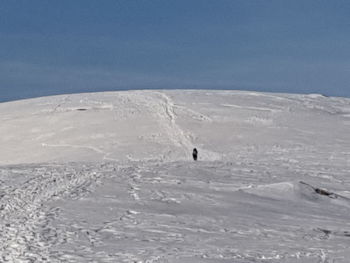 Scenic view of snowcapped mountain against sky