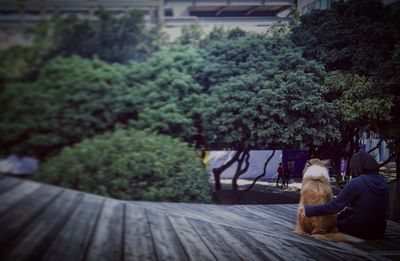 Man with trees in background