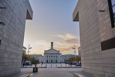 Buildings in city against sky