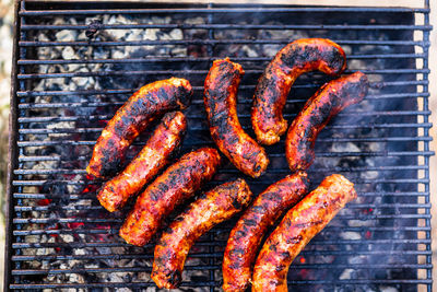 Close-up of meat on barbecue grill