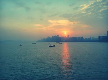 Scenic view of sea against sky during sunset