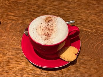 High angle view of coffee cup on table