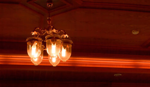 Low angle view of illuminated light bulb