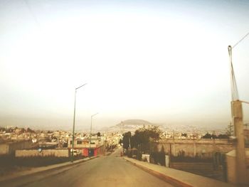 Street in city against clear sky