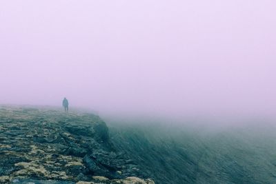 Scenic view of landscape during foggy weather