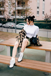 Woman sitting on bench