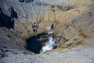 The hole and crater smoke mount bromo, indonesia