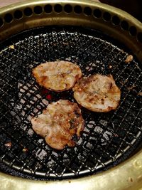 High angle view of meat in cooking pan