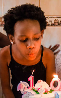 Portrait of woman with arms outstretched