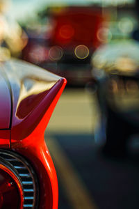 Close-up of car on road