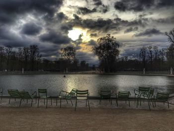 Scenic view of lake against cloudy sky