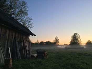 House on field against sky