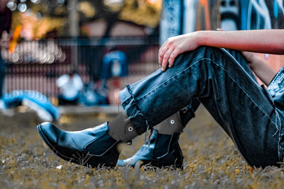 Low section of man wearing leather shoes