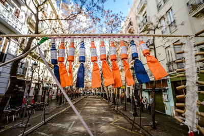 Low angle view of clothes drying against building