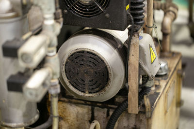 Close-up of old machine part