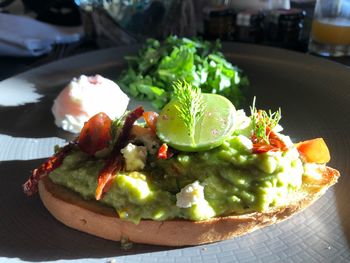 Close-up of fruits in plate on table