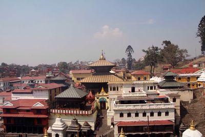 High angle view of temple and houses