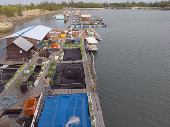 High angle view of river amidst buildings