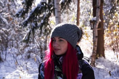 Portrait of young woman in winter