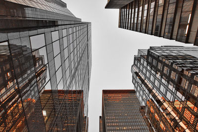 Low angle view of modern buildings against sky