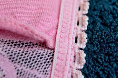 Close-up of pink woolen textile 