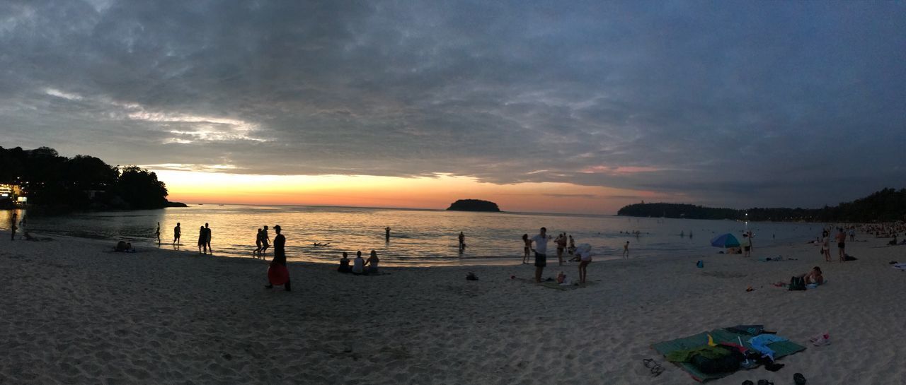 SCENIC VIEW OF BEACH AGAINST SKY DURING SUNSET