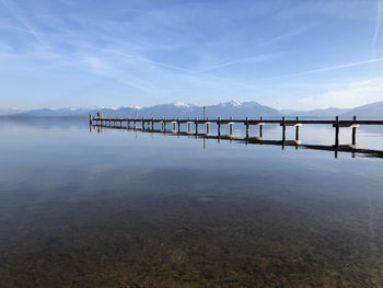 Pier on sea against sky