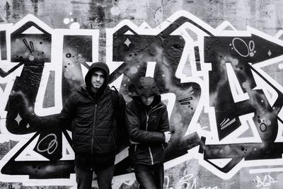 Portrait of friends standing outdoors