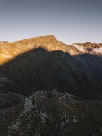 Scenic view of mountains against clear sky