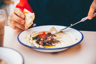 Close-up of woman in plate