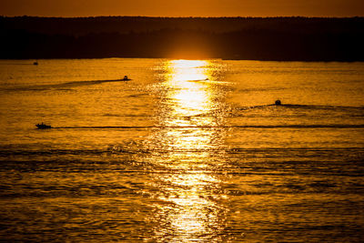 Scenic view of sunset over river