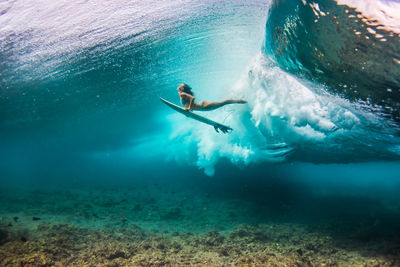 Man swimming in sea