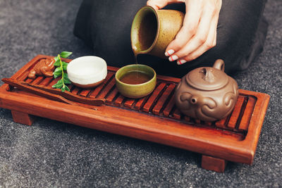 High angle view of person preparing food on table