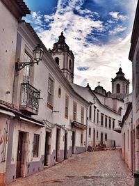 Old building against cloudy sky