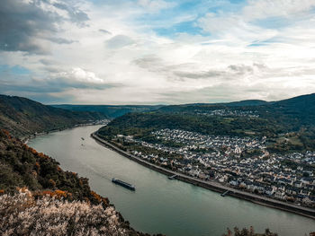 High angle view of bridge over river against cloudy sky