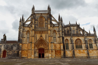 Low angle view of historical building against sky