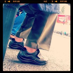 Close-up of woman standing in pond