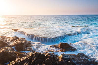 Scenic view of sea against clear sky