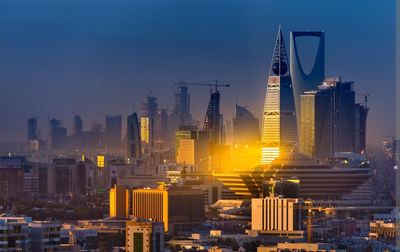 Cityscape against sky during sunset