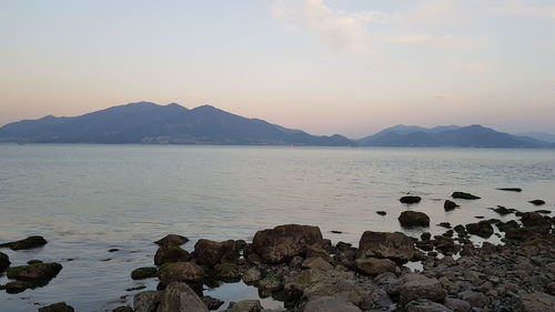 Scenic view of sea against sky during sunset