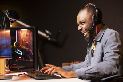 Young woman using laptop at home