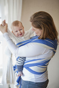 Mother with baby in baby sling