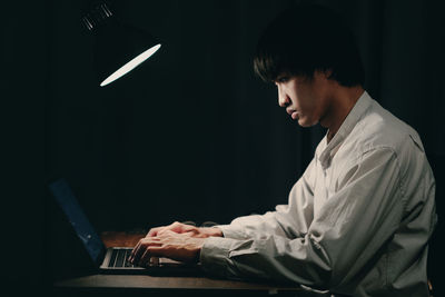 Young man using laptop