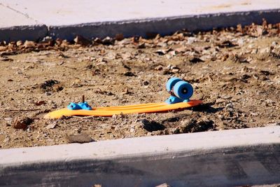 Close-up of toy on sand