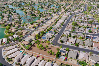 High angle view of street amidst buildings in town